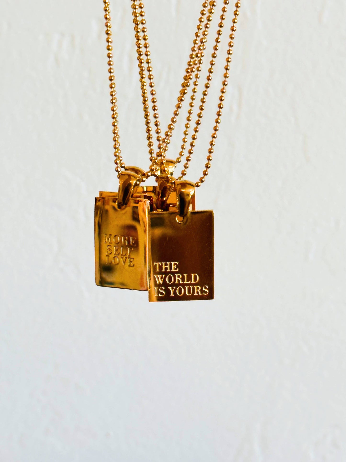 Mila + Stevie - "The World is Yours" Empowerment Necklace