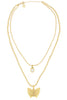Gold necklace with a butterfly pendant on a white background